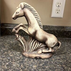 Ceramic horse statue